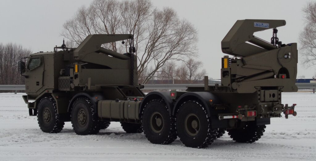 Truckmount side loading trailer